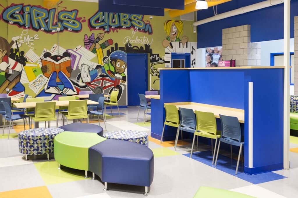 Boys and Girls Club graffiti mural community room bright colors and funky furniture Rochester NY
