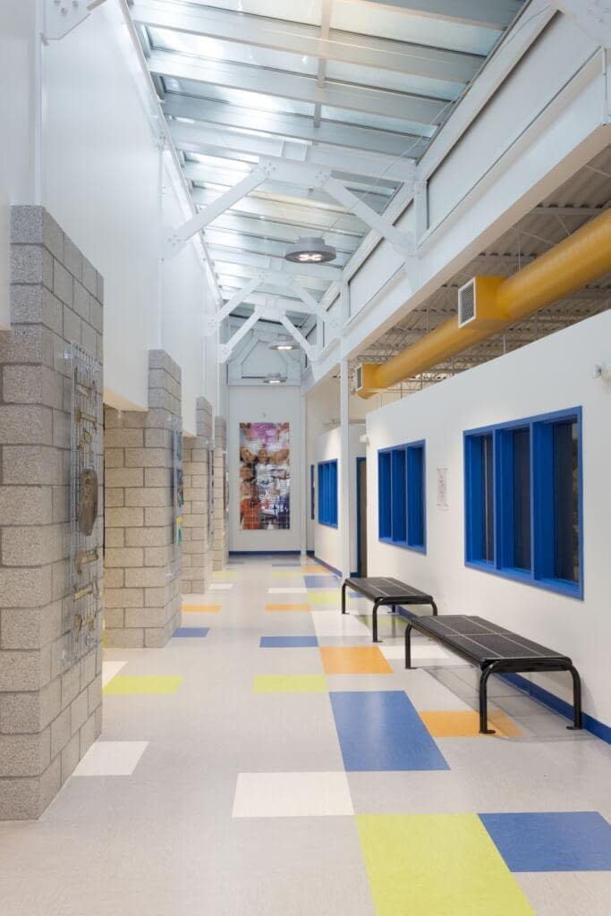 Entrance corridor Boys and Girls Club Rochester NY with skylights bright colors